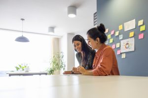 businesswomen working together at a coworking office
